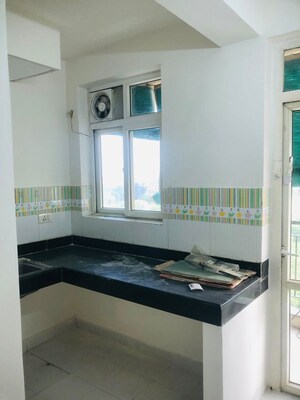 Kitchen in 1 BHK Apartment at Auric City Homes, Sector 82 – for Rent