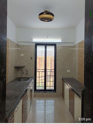 Kitchen in 3 BHK Apartment at Leena Bhairav Residency, Mira Road – for Sale
