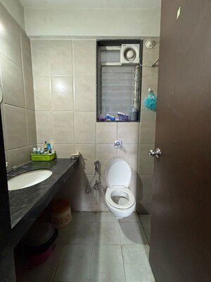 Bathroom in 3 BHK Apartment at Dahanukar Colony – for Rent