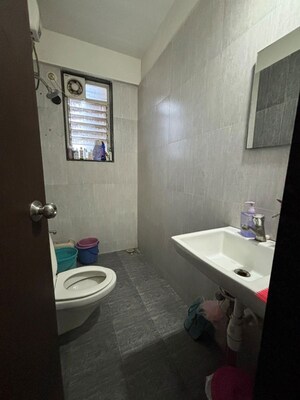 Bathroom in 3 BHK Apartment at Dahanukar Colony – for Rent