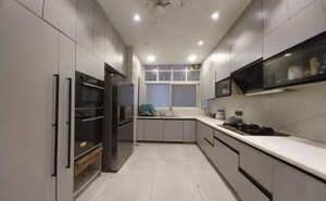 Kitchen in 3 BHK Apartment at ACE Golf Shire, Sector 150 – for Sale