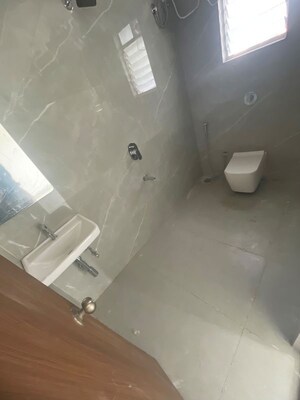 Bathroom in 2 BHK Apartment at Pratham 5TH Element, Andheri West – for Rent