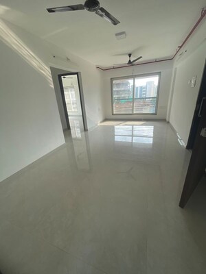 Room in 2 BHK Apartment at Pratham 5TH Element, Andheri West – for Rent