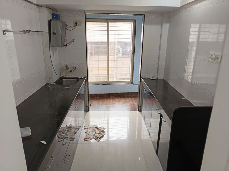 Kitchen, laxmi-paradise-apartments 2 Bedroom 900 Sq.Ft. Apartment In Mira Road Thane 10697724