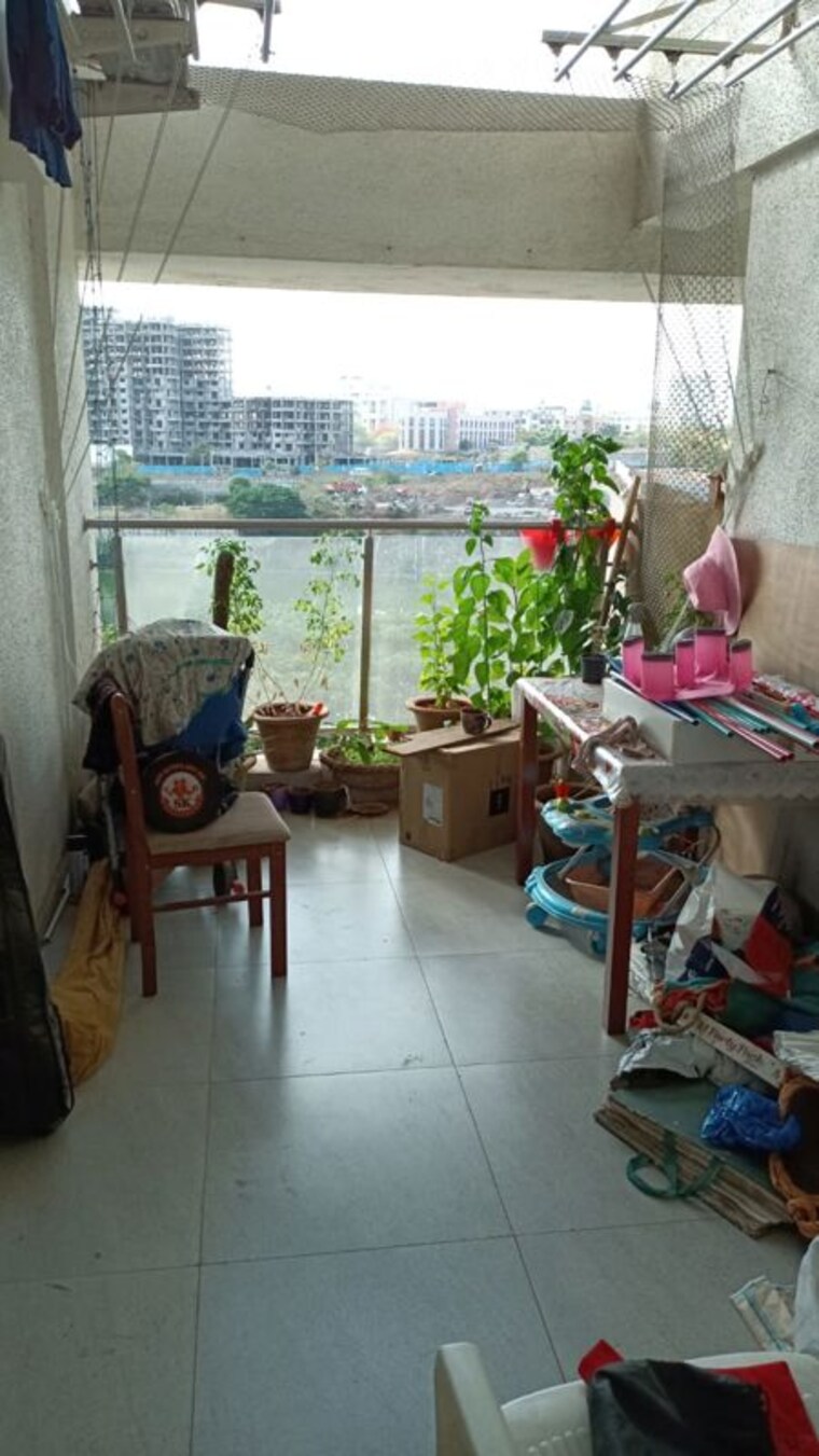 Living Room, gera-misty-water 2 Bedroom 804 Sq.Ft. Apartment In Mundhwa Pune 10697737
