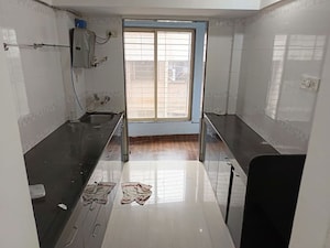 Kitchen in 2 BHK Apartment at Lucky Sagar Drasti, Mira Road – for Rent