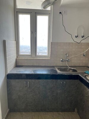 Kitchen in 3.5 BHK Apartment at Shiv Sai Ozone Park, Sector 86 – for Sale