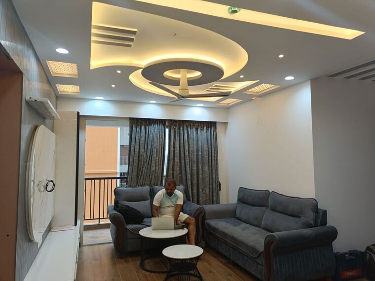 Living Room, unique-k-town 3 Bedroom 1037 Sq.Ft. Apartment In Kiwale Pune 10697871