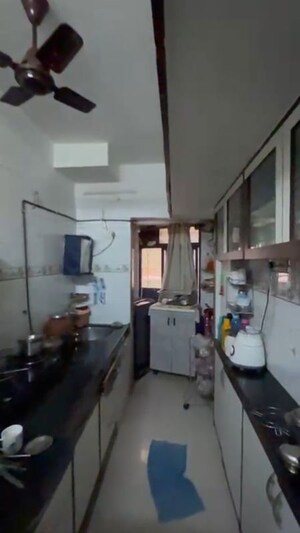 Kitchen in 2 BHK Apartment at Satellite Span, Andheri East – for Rent