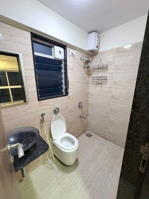 Bathroom in 3 BHK Apartment at RNA NG Eclat, Andheri West – for Rent