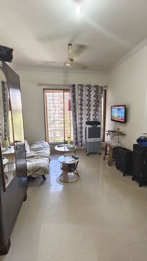 Living Room in 1 BHK Apartment at Bhoomi Park, Malad West – for Rent