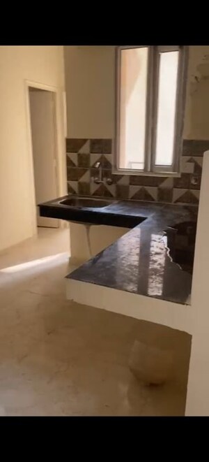Kitchen in 2 BHK Apartment at MRG The Balcony, Sector 93 – for Rent
