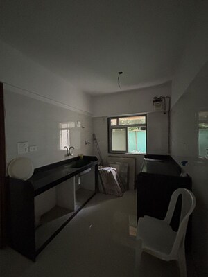 Kitchen in 2 BHK Apartment at Sheela Smruti Apartment, Vile Parle East – for Sale