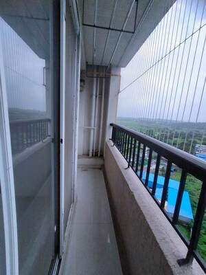 Balcony in 1 BHK Apartment at Unnati Woods CHS, Kasarvadavali – for Rent