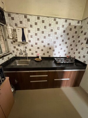 Kitchen in 1 BHK Apartment at Ajmera Exotica, Wagholi – for Sale