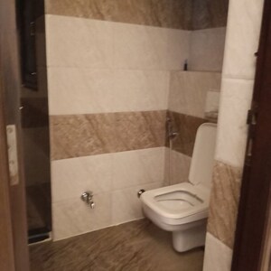 Bathroom in 3 BHK Apartment at Ansal Sushant Apartments, Sushant Lok I – for Rent