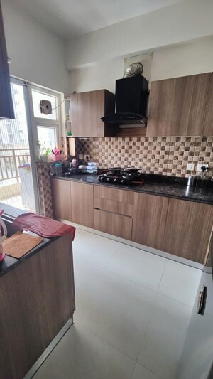 Kitchen in 3.5 BHK Apartment at Adani M2K Oyster Grande, Sector 102 – for Rent