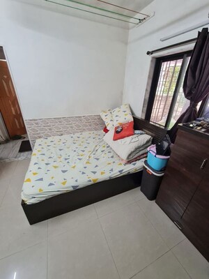 Bedroom in 2 BHK Apartment at Straft Golden View CHS, Vile Parle West – for Rent