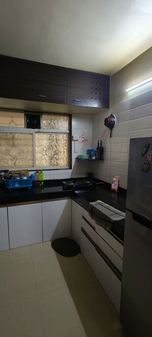 Kitchen in 1.5 BHK Apartment at Shreyas Palladium Grand, Dhanori – for Rent