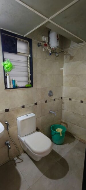 Bathroom in 1.5 BHK Apartment at Shreyas Palladium Grand, Dhanori – for Rent