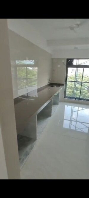 Kitchen in 3 BHK Apartment at Prachi CHS, Navpada – for Rent