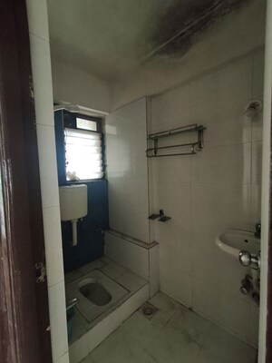 Bathroom in 1 BHK Apartment at Raunak Heights, Ghodbunder Road – for Rent