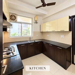 Kitchen in 3 BHK Builder Floor at Ansal API Esencia, Sector 67 – for Sale
