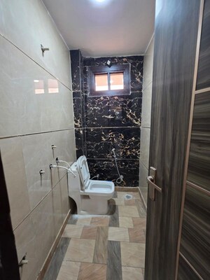 Bathroom in 2 BHK Builder Floor at Dwarka Mor – for Rent