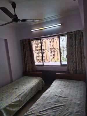 Bedroom in 2 BHK Apartment at SBI Milan Apartment, Jogeshwari West – for Rent