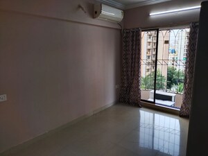 Room in 2 BHK Apartment at SBI Milan Apartment, Jogeshwari West – for Rent