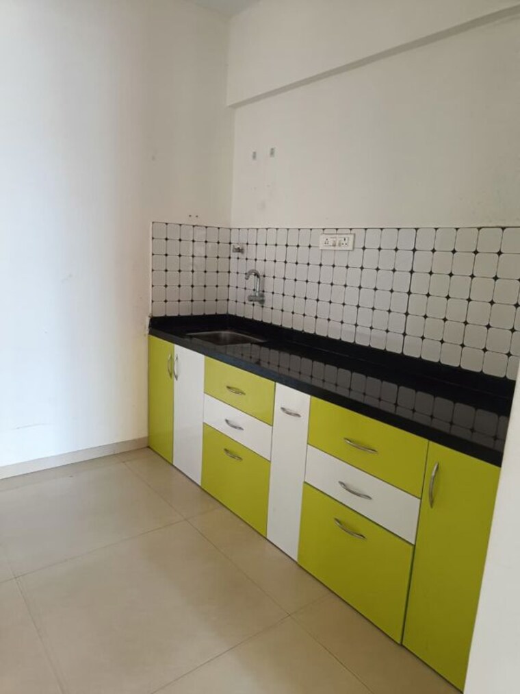 Kitchen, vision-starwest-phase-2 2 Bedroom 513 Sq.Ft. Apartment In Tathawade Pune 10698309