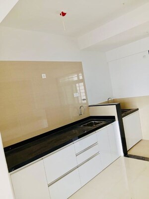 Kitchen in 3 BHK Apartment at Raga Top Towers, Wakad – for Rent