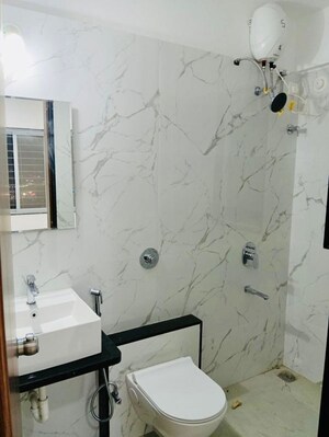 Bathroom in 3 BHK Apartment at Raga Top Towers, Wakad – for Rent
