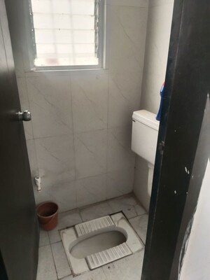 Bathroom in 1 BHK Apartment at Bramha Aangan, Salunkhe Vihar Society – for Sale
