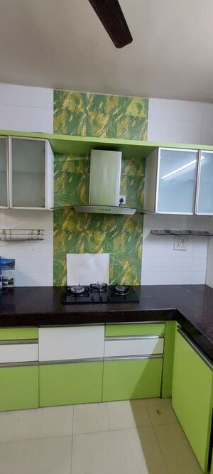 Kitchen in 3 BHK Apartment at Rohan Nilay, Aundh – for Rent