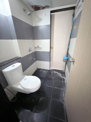 Bathroom in 2 BHK Apartment at Paranjape Blue Ridge, Hinjewadi – for Rent