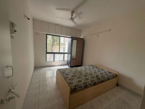 Bedroom in 2 BHK Apartment at DNV Elite Gardens, Aundh – for Rent