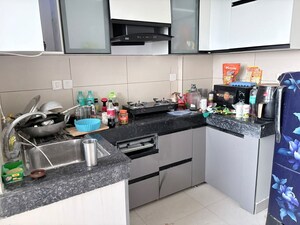 Kitchen in 2 BHK Apartment at Tata Eureka Park, Sector 150 – for Rent