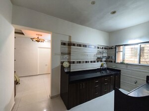 Kitchen in 1 BHK Apartment at GK Rose Icon, Pimple Saudagar – for Rent
