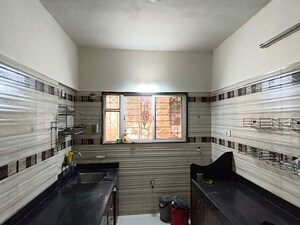 Kitchen in 1 BHK Apartment at GK Rose Icon, Pimple Saudagar – for Rent