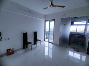Living Room in 1 BHK Apartment at Metropolis Bayside, Kasarvadavali – for Rent