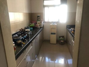 Kitchen in 1 BHK Apartment at Metropolis Rivera, Kasarvadavali – for Rent