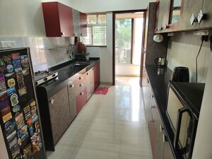 Kitchen in 2 BHK Apartment at Kolte Patil Aleria, Kharadi – for Rent