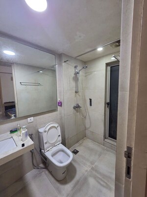 Bathroom in 2 BHK Apartment at Unnati Woods CHS, Kasarvadavali – for Rent