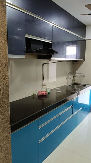Kitchen in 2 BHK Apartment at Unnati Woods CHS, Kasarvadavali – for Rent