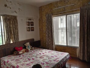 Bedroom in 2 BHK Apartment at Eden Greenlands, Rahatani – for Rent
