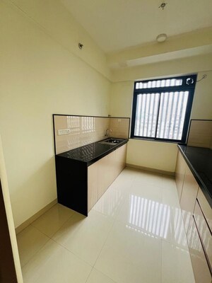 Kitchen in 2 BHK Apartment at Dynamix Divum, Malad East – for Rent