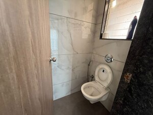 Bathroom in 2 BHK Apartment at Swastik Regalia, Waghbil – for Rent
