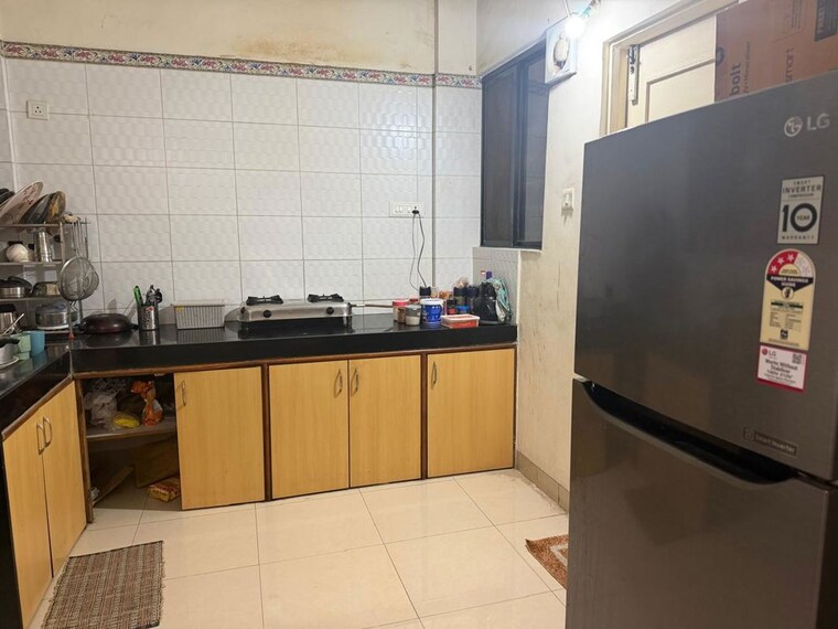 Kitchen, amanora-desire-tower 1 Bedroom 560 Sq.Ft. Apartment In Magarpatta Road Pune 10698922