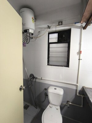 Bathroom in 3 BHK Apartment at Shreyas Palladium Grand, Dhanori – for Rent